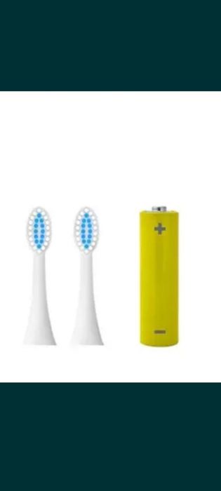 Электрическая зубная щетка