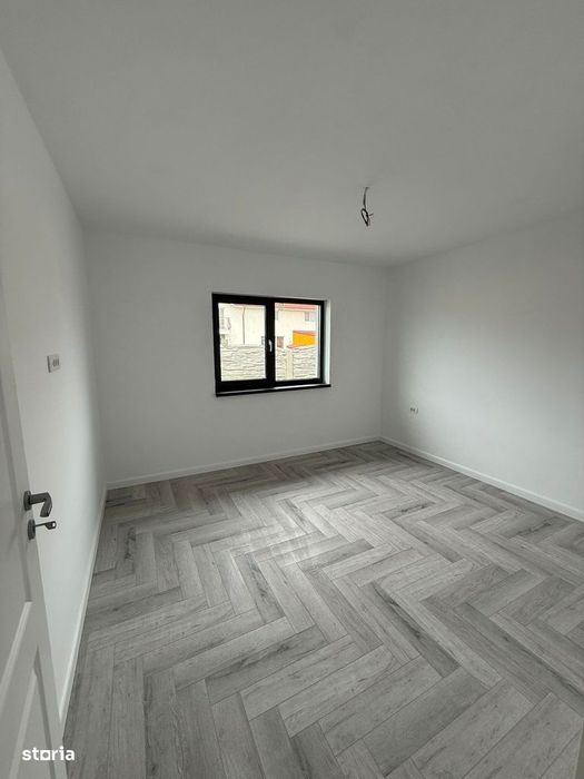 Casa pe parter cu 4 camere , incalzire in pardoseala , teren 400 mp