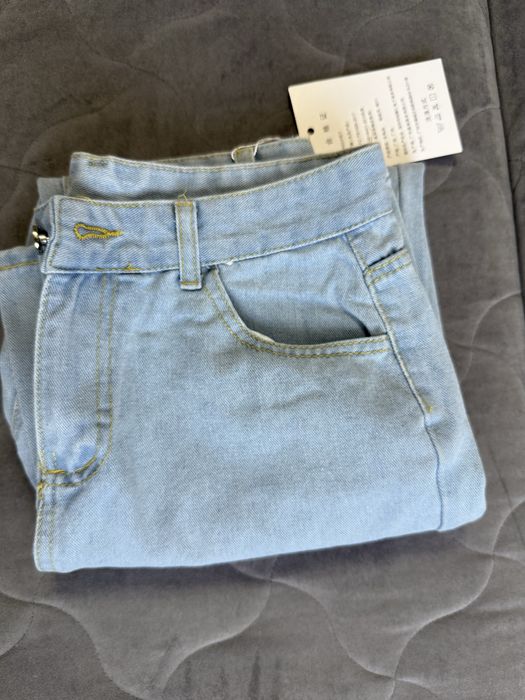 Джинсы новые