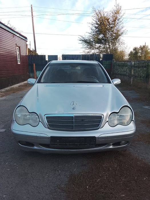 Мерседес Бенц W203