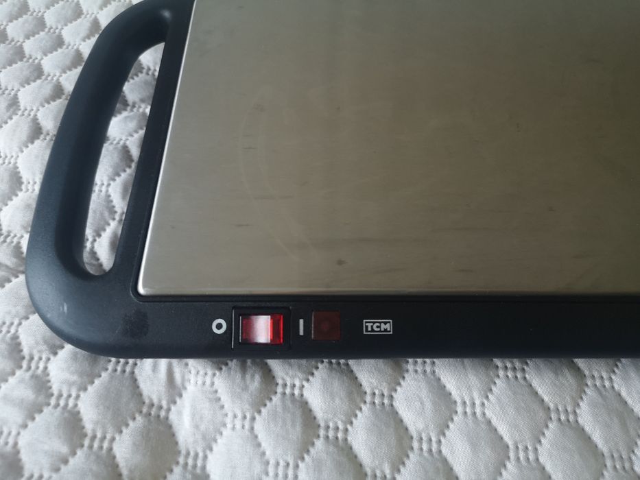 Подгряваща плоча за маса