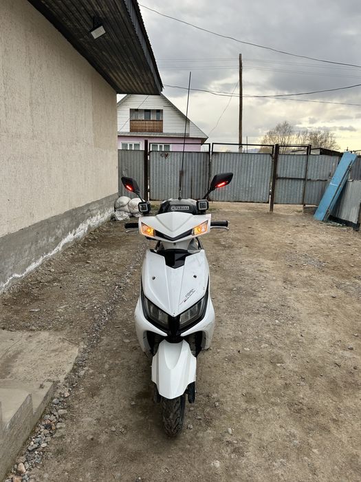 Мопед       М. 8 125 к у б