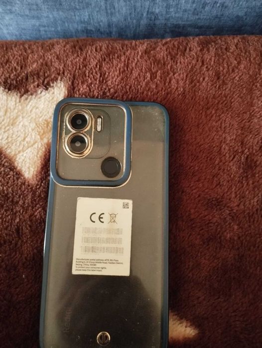 Продам телефон редми  А+2.3 64память1