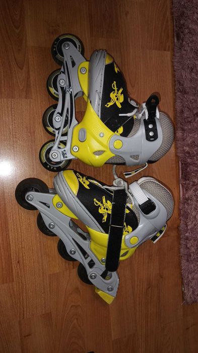 Role copii marca STS, masura reglabila 31-34 - produs in stare buna