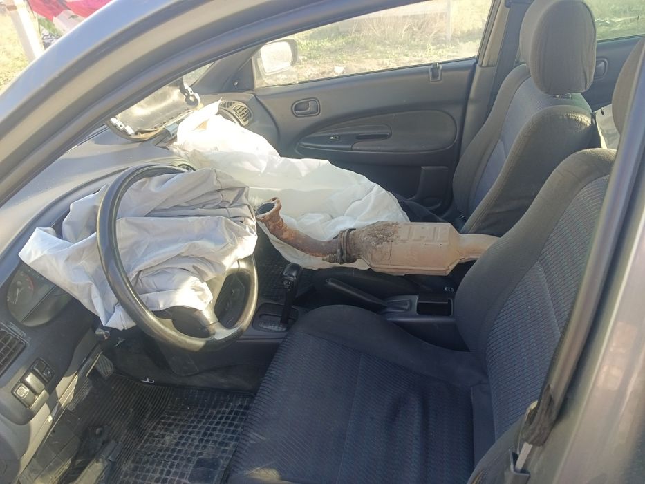 Мазда 323      200 000тг