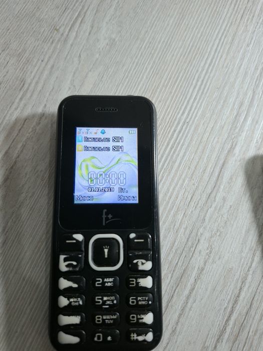 Knopkali telefon