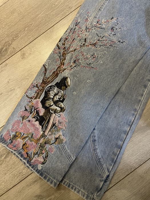 Джинсы сакура,размер L