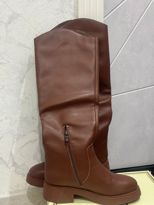 Продаеться сапоги