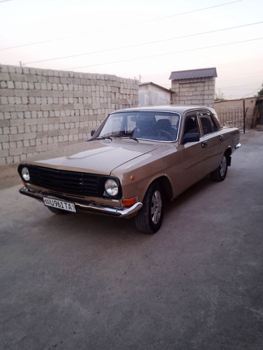 Автомобиль газ 2411