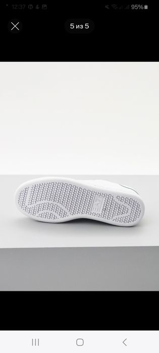 Продаются белые кеды EА7