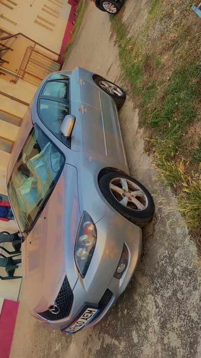 Vănd mazda M1 2004
