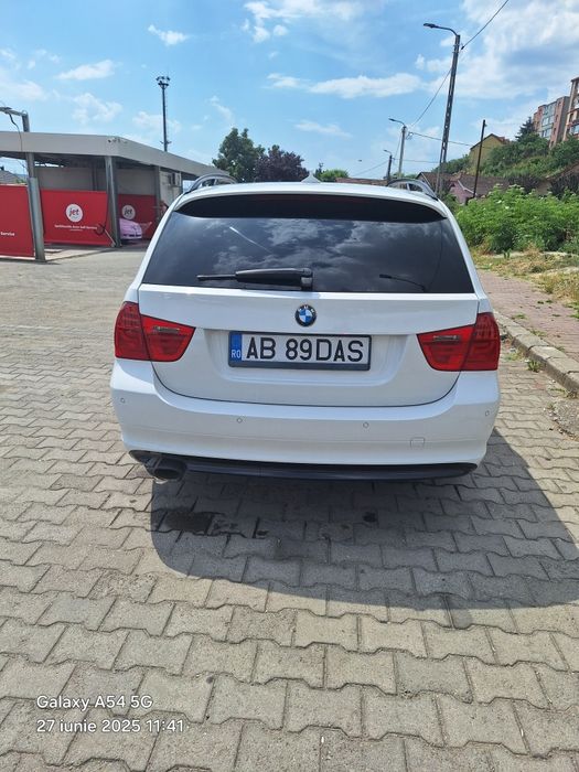 vând BMW e91 x drive