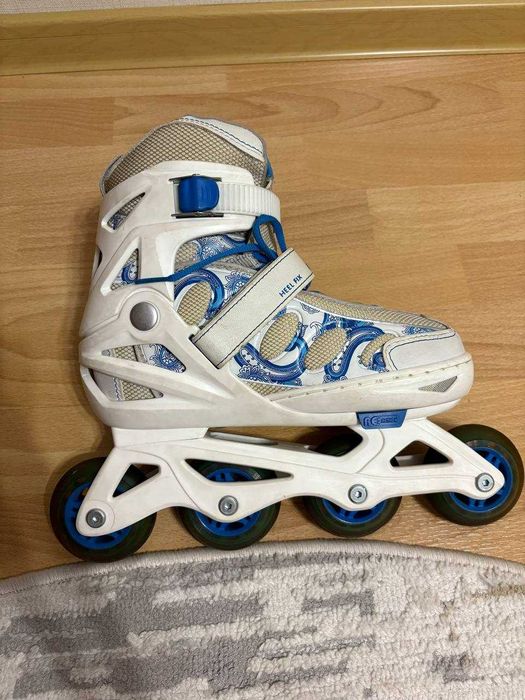 Роликовые коньки раздвижные.