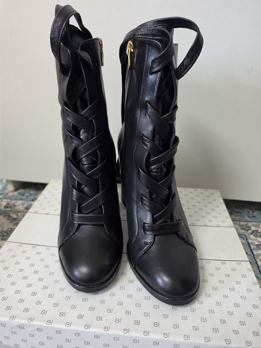 Продам женские сапоги