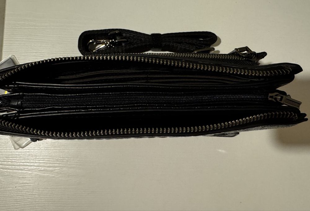 Продам новую барсетку НТ, натуральная кожа.