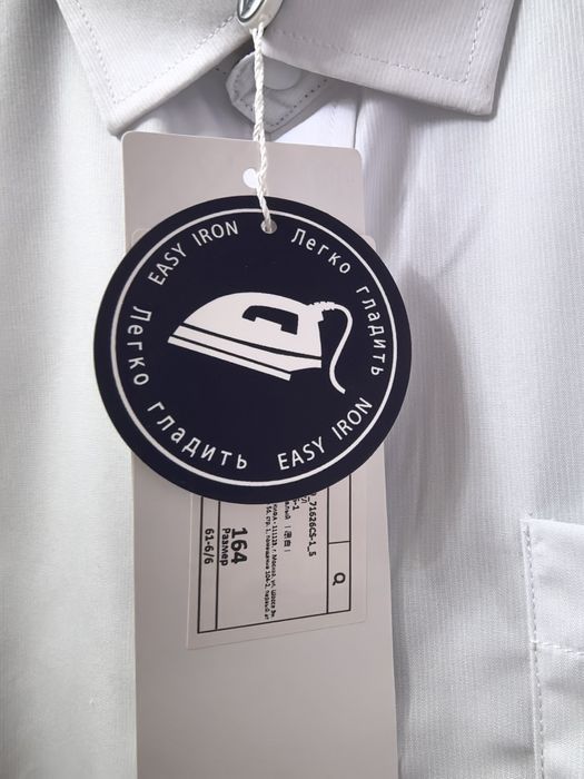 Продам новую  рубашку 164см