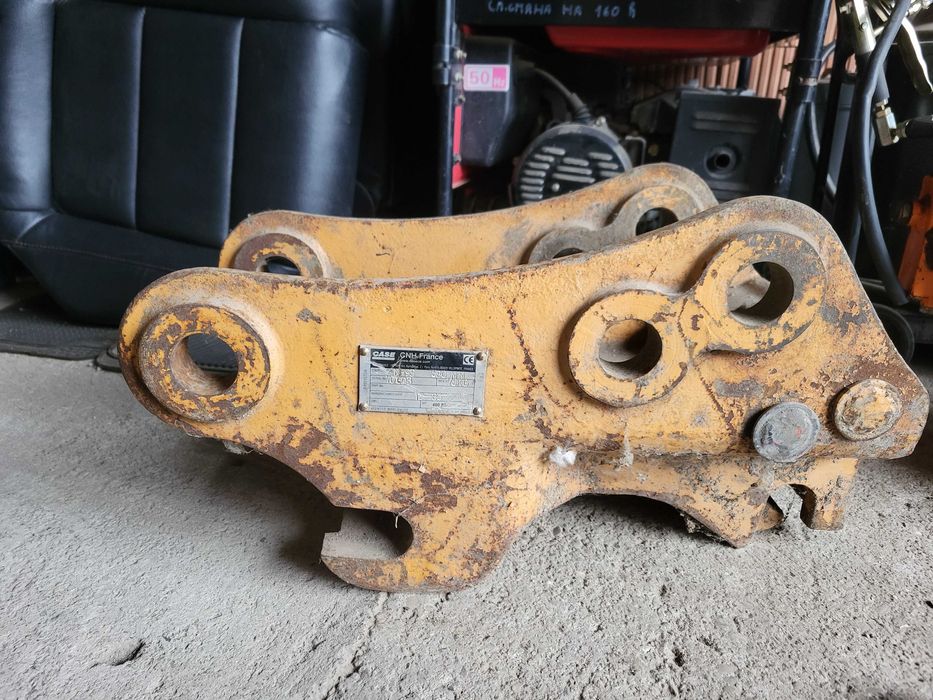 Механичен бързосменник за комбиниран багер CASE/NEW HOLLAND