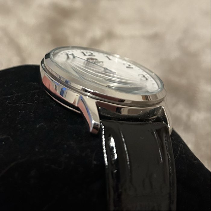 Часовник ORIENT Open Heart