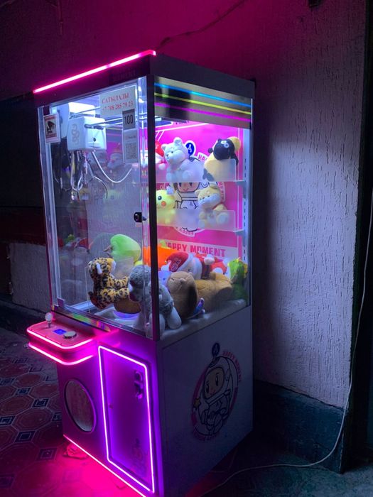 Игровой аппарат хватайка
