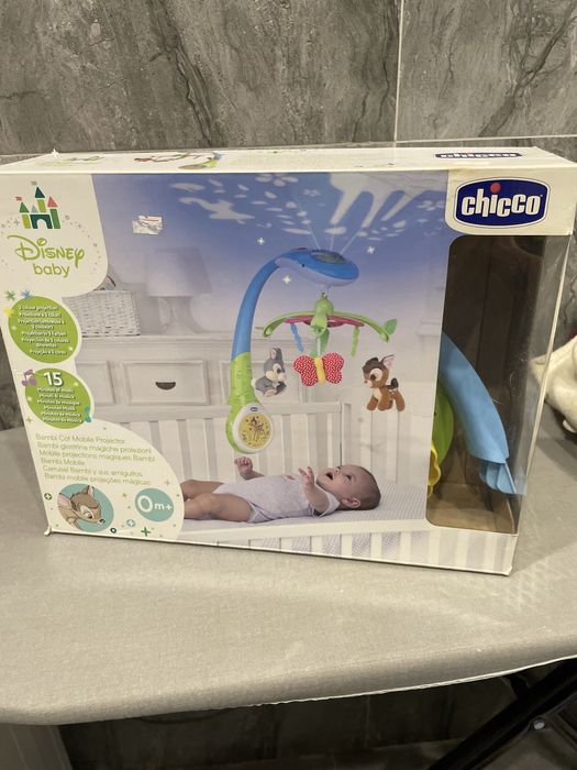 Музыкальная игрушка над кроватью