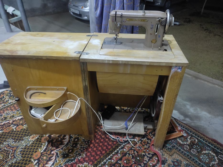 Podolsk tikuv mashinasi mator qoyilgan