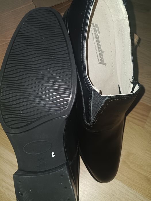 Продам новые кожаные туфли