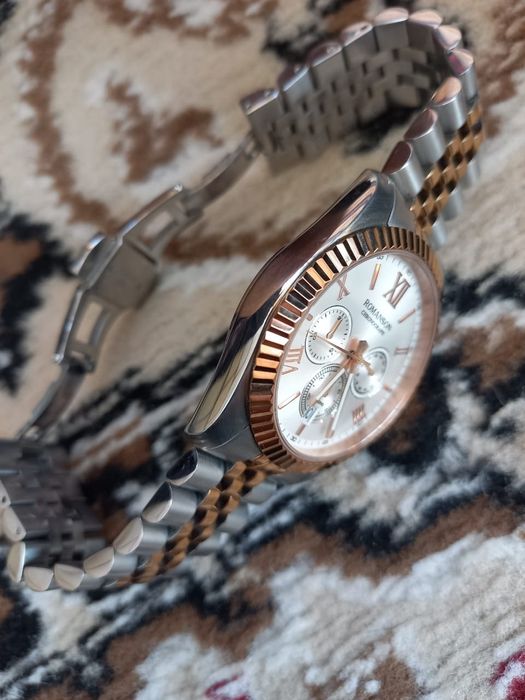 Продам часы Romanson