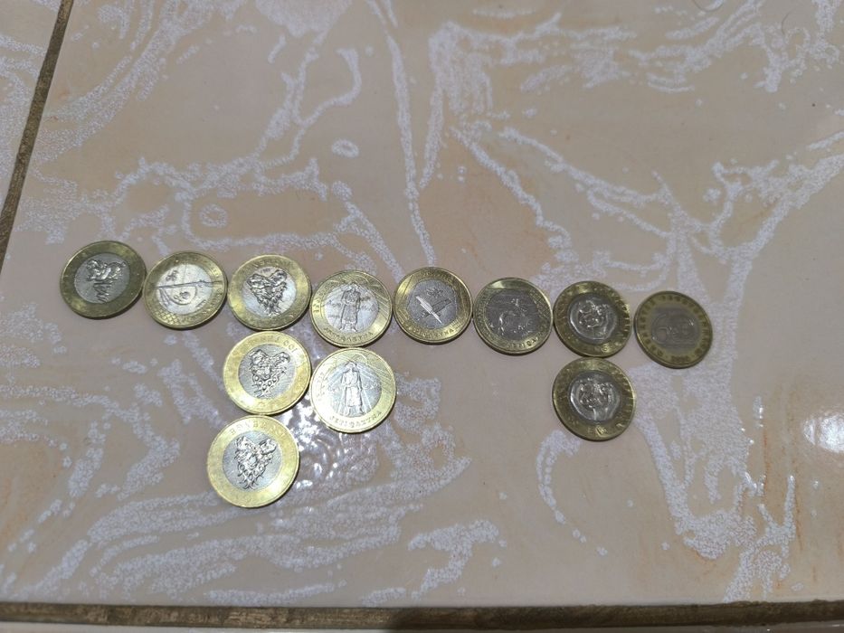 Манеты сто тенге