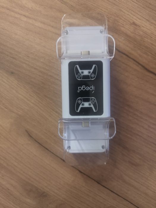 Playstation 5 slim с 4 игри и устройство за зареждане на джойстик