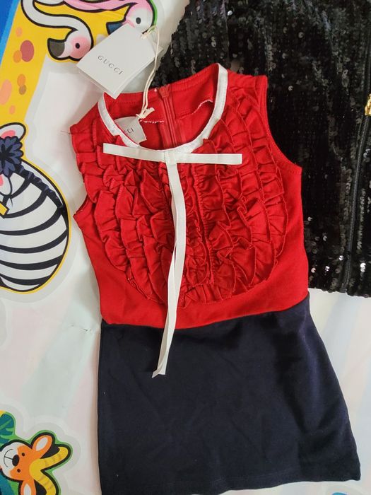 Lot 2 bucăți haine copii rochie Gucci geaca paiete 98