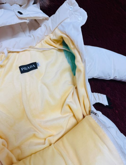 Продам зимний комбинезон Prada