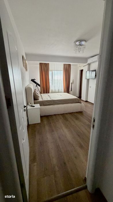 Apartament cu 2 camere, loc de parcare, curte cu loc de joacă, foișor