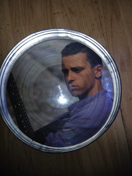 Eros Ramazzotti vinil in cutie de colecție rotundă de tablă
