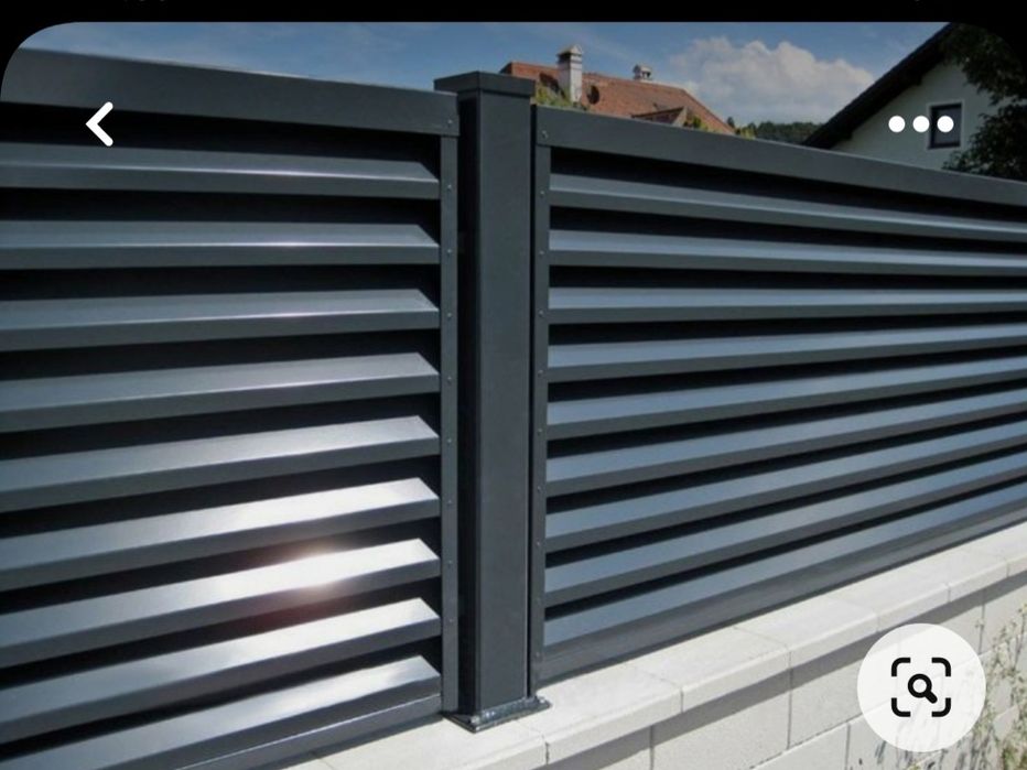 металлическийе заборы-жалюзи современно и надежно.