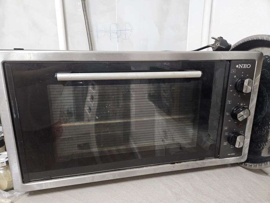 Продам электрическую печь Neo