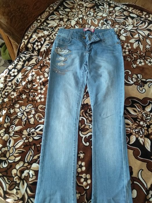 Джинсы на девочку