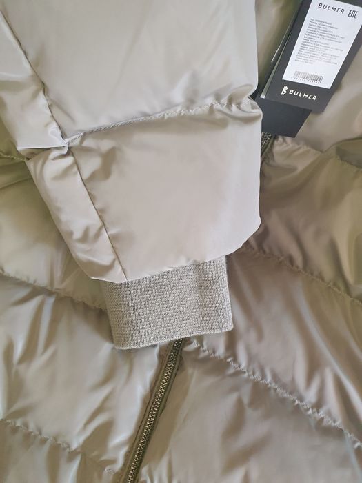 Продам пуховик новый