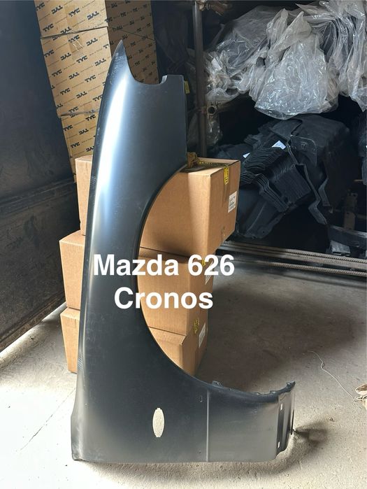 Крыло Mazda cronos.  Mazda 626 88/99