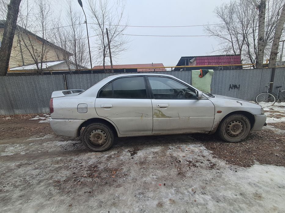 Машина митсубиши мираж