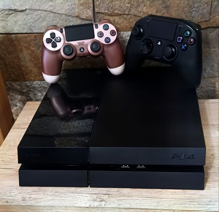 PlayStation 4/Ps4 Phat 500 GB HDD cu +20 jocuri instalate + 2 Controllere + 1 Joc pe CD Cadou