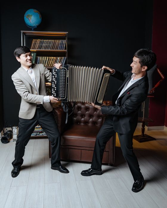 Домбыра баян музыкант