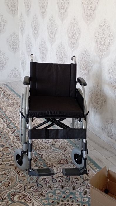 Инвалитны коляска жана