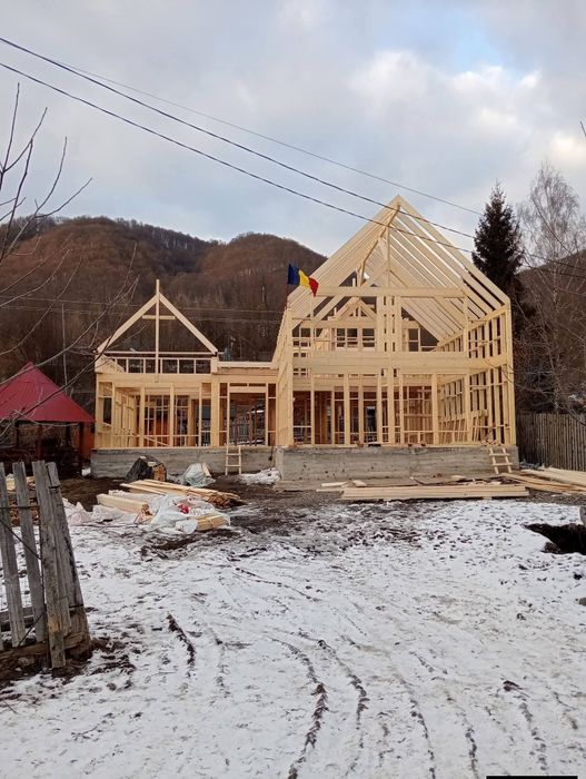 Vindem case cu două dormitoare baie bucătărie și living
