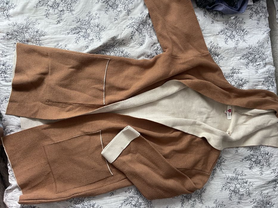 одежды по 1000 тг