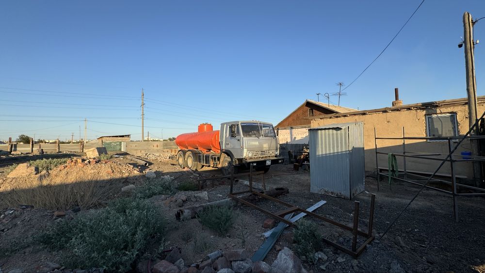 Продам землю с постройкой