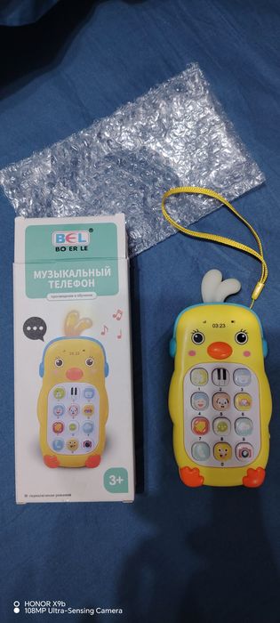 Продам детский музыкальный телефон