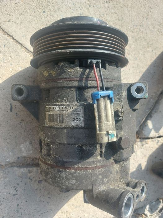 Компрессор кондиционера на Chevrolet Cruise либо Daewoo lacetti