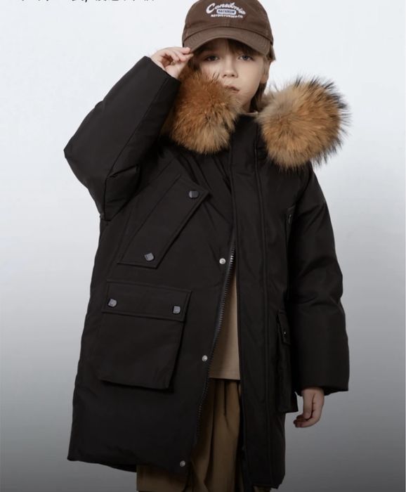 Продам зимний пуховик для мальчика 140 рост