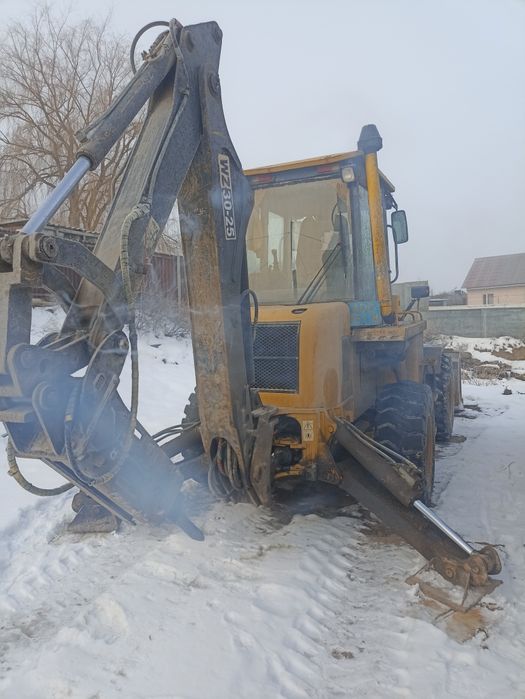 Услуги экскаватора - погрузчика 3в1