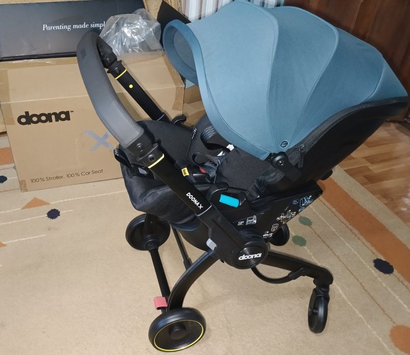 Новая коляска doona